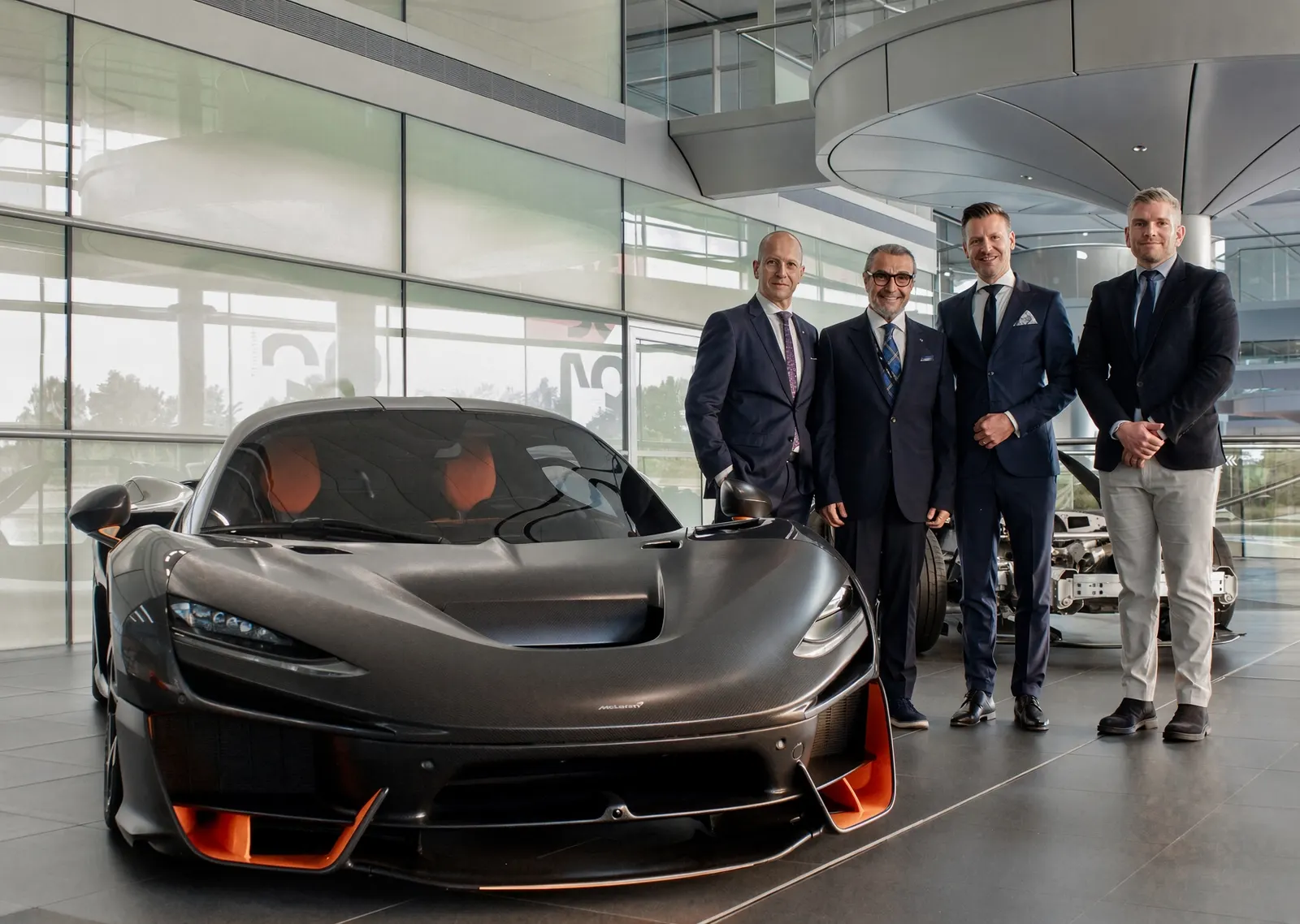 McLaren vehicle undergoing maintenance in a technical workshop